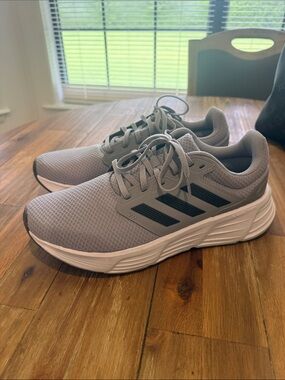 adidas Gray Athletic Sneakers with Black Stripes